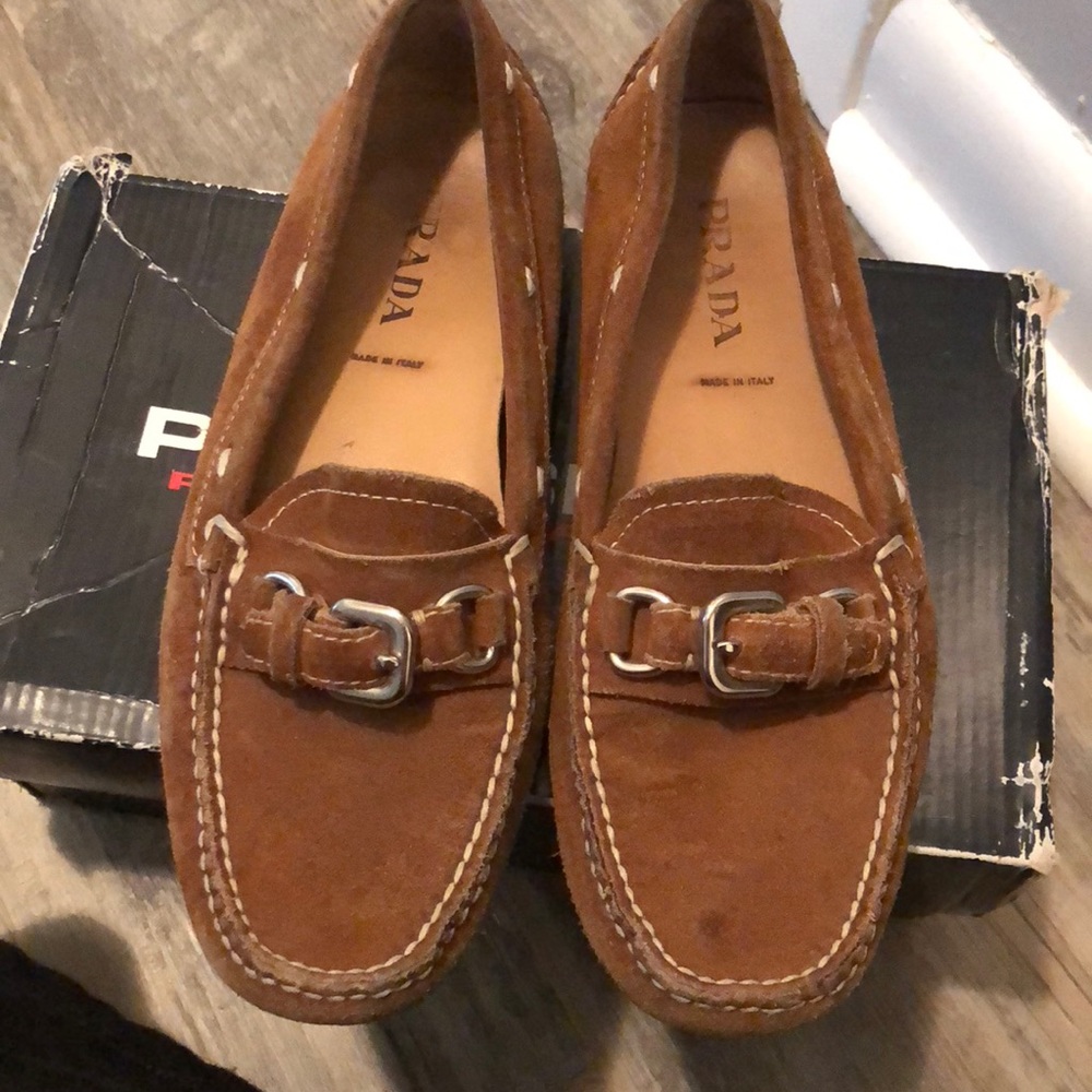 Prada loafers.